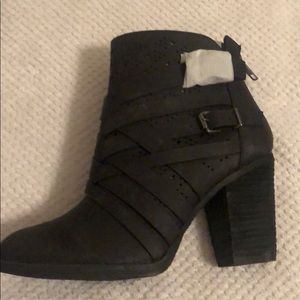 Not rated black faux leather boots